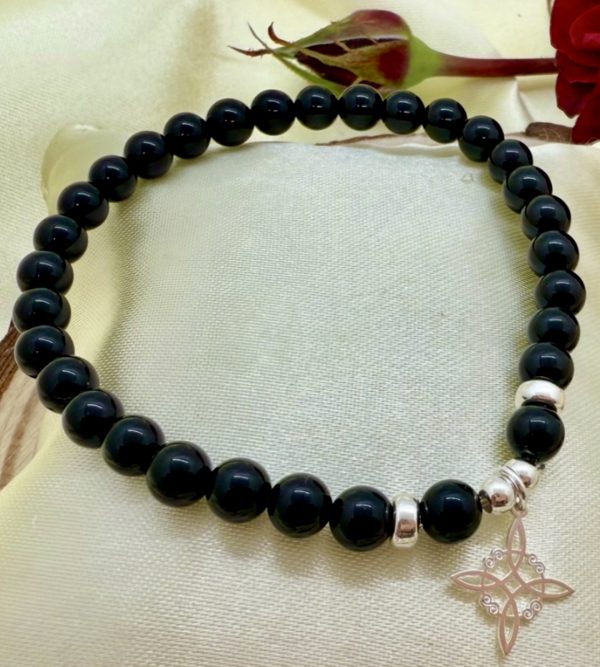 PN 0025 - Foto1 Pulsera Onix 6 mm con Plata y Nudo de Bruja
