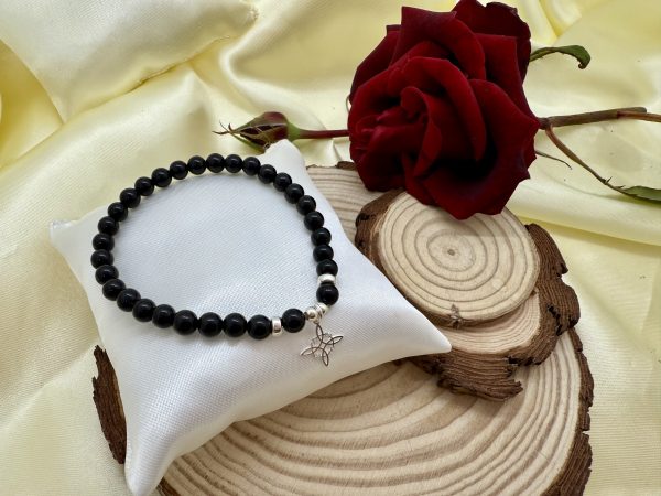 PN 0025 - Foto3 Pulsera Onix 6 mm con Plata y Nudo de Bruja