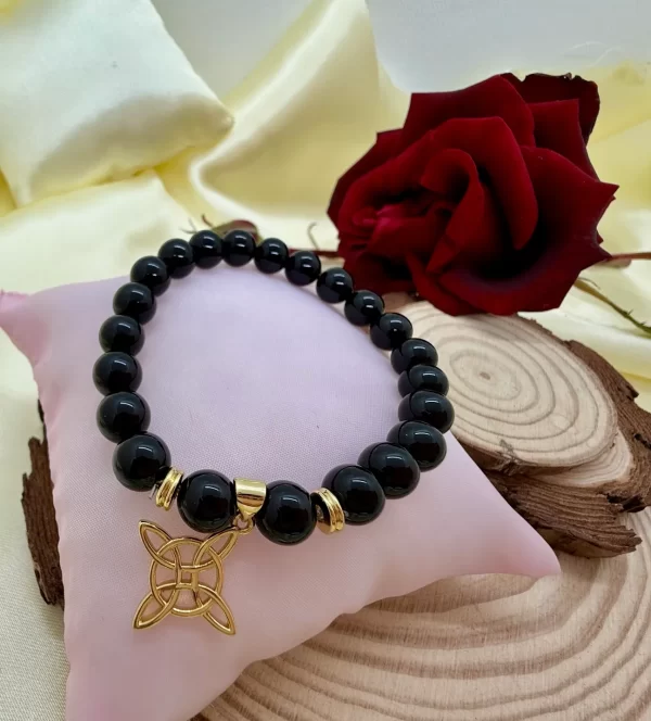 PN 0026 - Foto 2 Pulsera Onix 8 mm con Baño Oro Nudo de Bruja