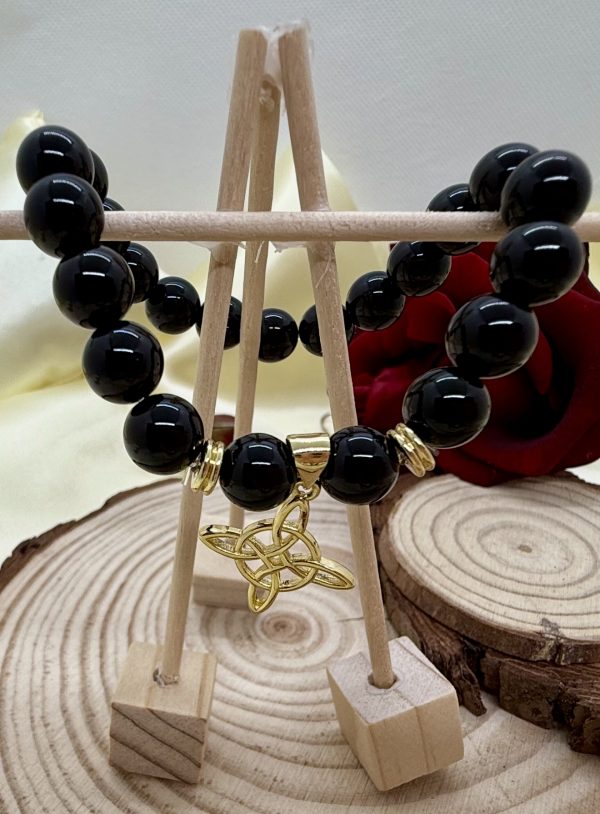 PN 0026 - Foto5 Pulsera Onix 8 mm con Baño Oro Nudo de Bruja