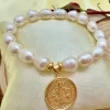 PN 0035 - Foto 1 Pulsera de Perlas de Rio 10 mm con baño de oro Medalla San Benito